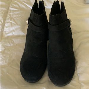 Black suede booties with wedge heel